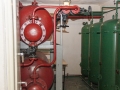 Zbiorniki zapasów wody: zielone dla zimnej, czerwone dla ciepłej